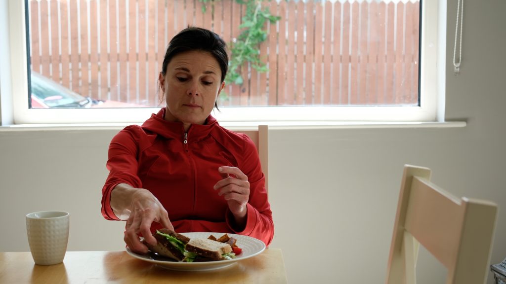 Dr Raph O'Connor enjoying a sandwich